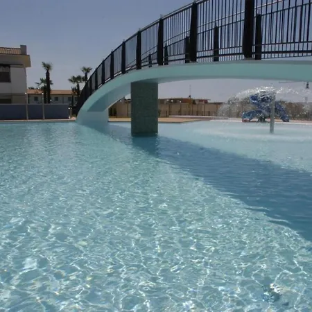 Апартаменты Comfortable Family With Swimming Pool Бибионе
