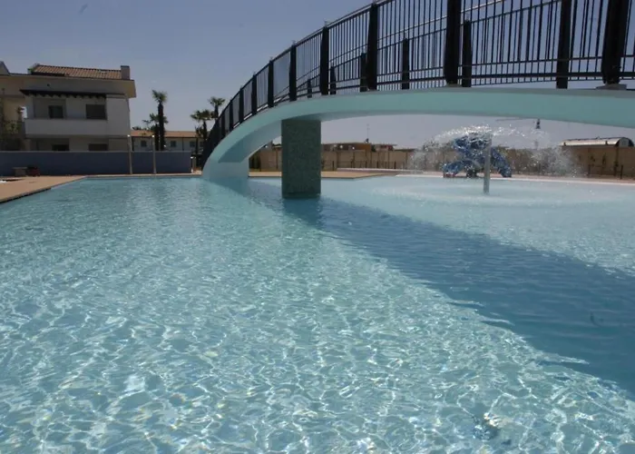 Апартаменты Comfortable Family With Swimming Pool Бибионе